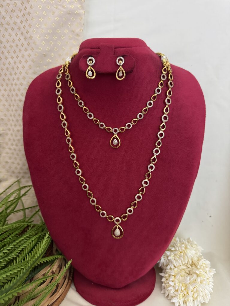 Elegant gold layered necklace set with matching earrings – jewellery trends 2025 collection by Hautecouture Jewellery.