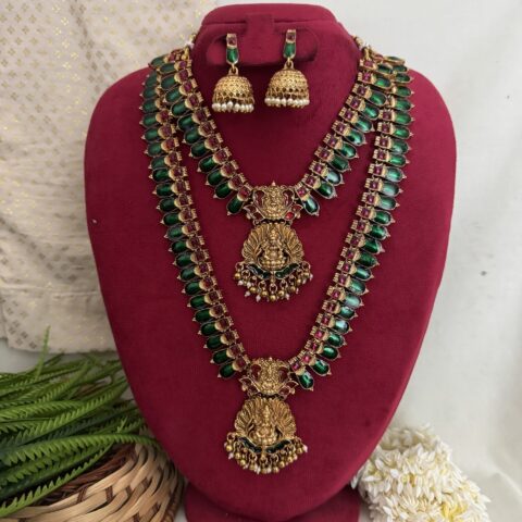 Traditional green and gold haram jewellery set with matching jhumka earrings from Hautecouture Jewellery