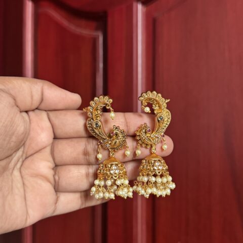 Rajamatha Peacock Jhumka Designed for Grand Weddings and Regal Celebrations